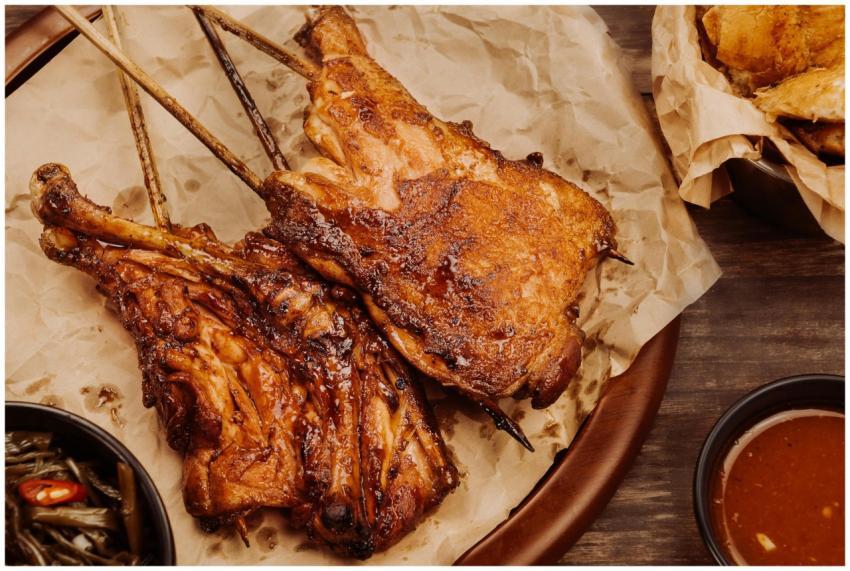 Juicy grilled chicken served with dipping sauce an