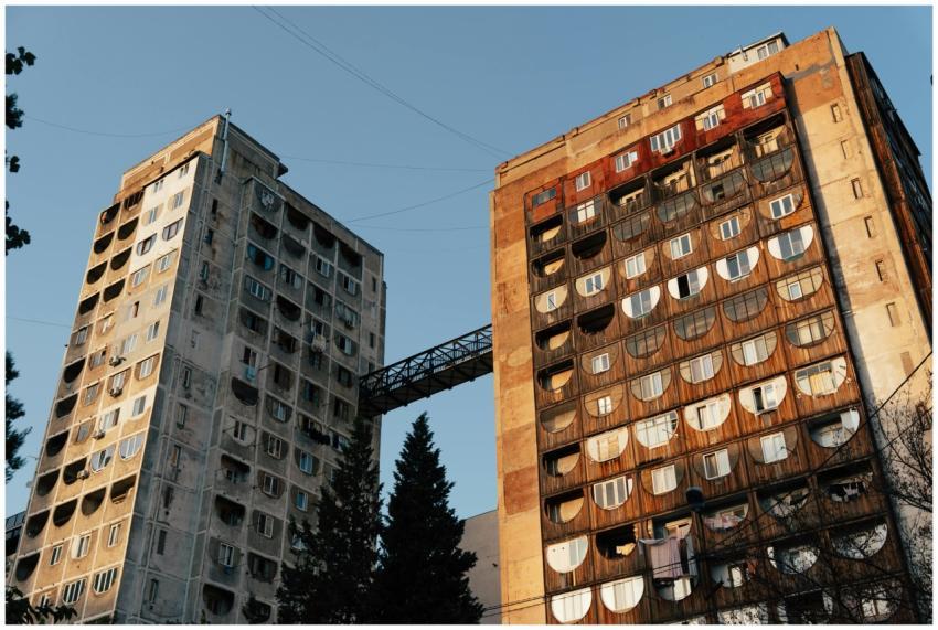 Two dilapidated Soviet-era apartment buildings in
