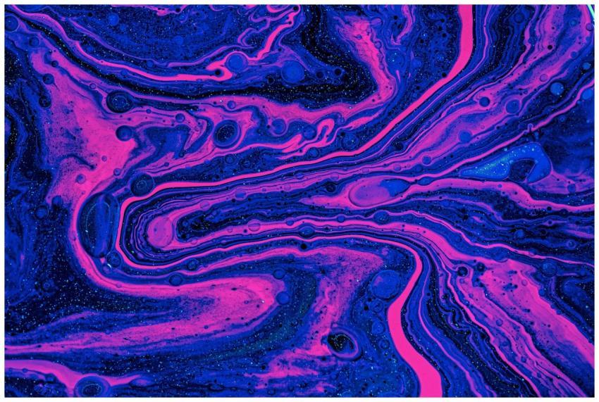 Dynamic swirls of magenta and blue create a vibran