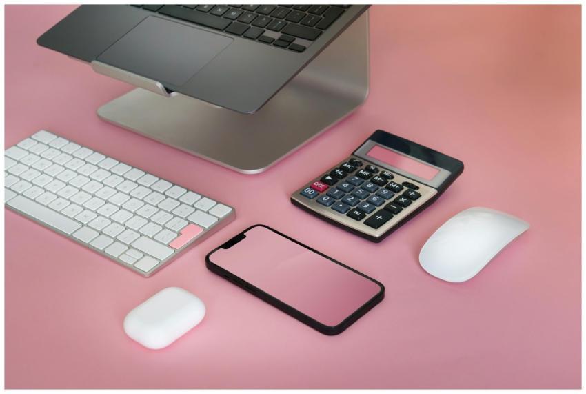 Top view of a minimalist workspace featuring elect