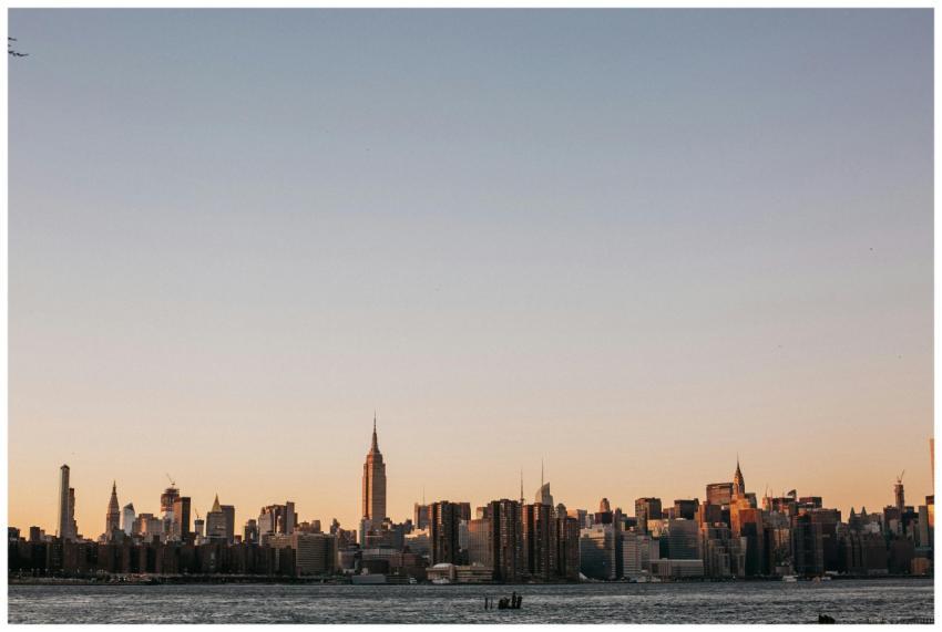 Stunning view of New York City skyline at sunset,