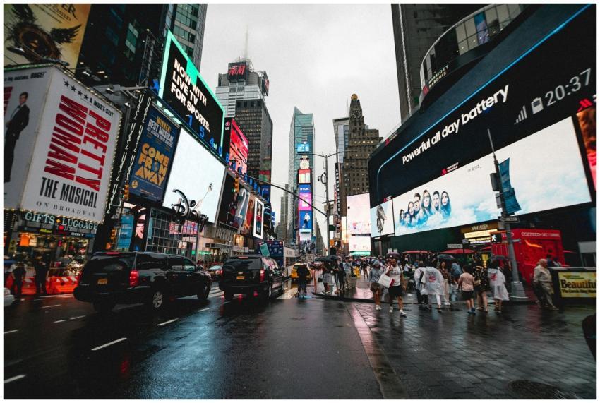 Night view of Times Square in NYC with illuminated