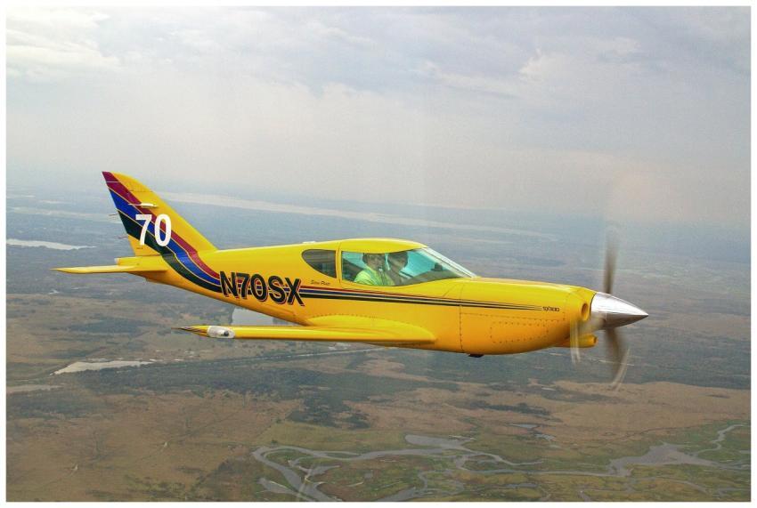 Yellow Airplane Flying Over