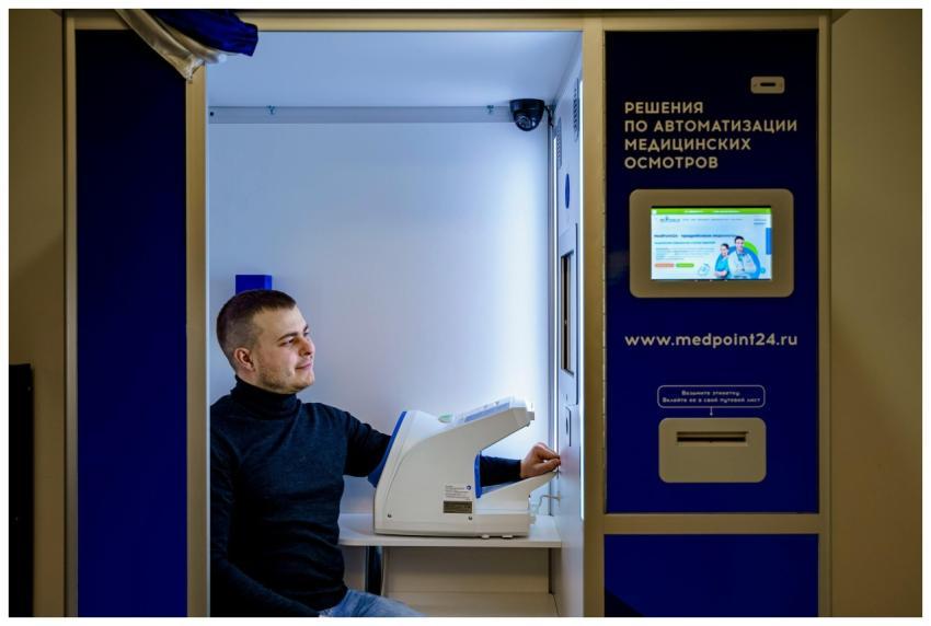 Caucasian man smiling while using automated health