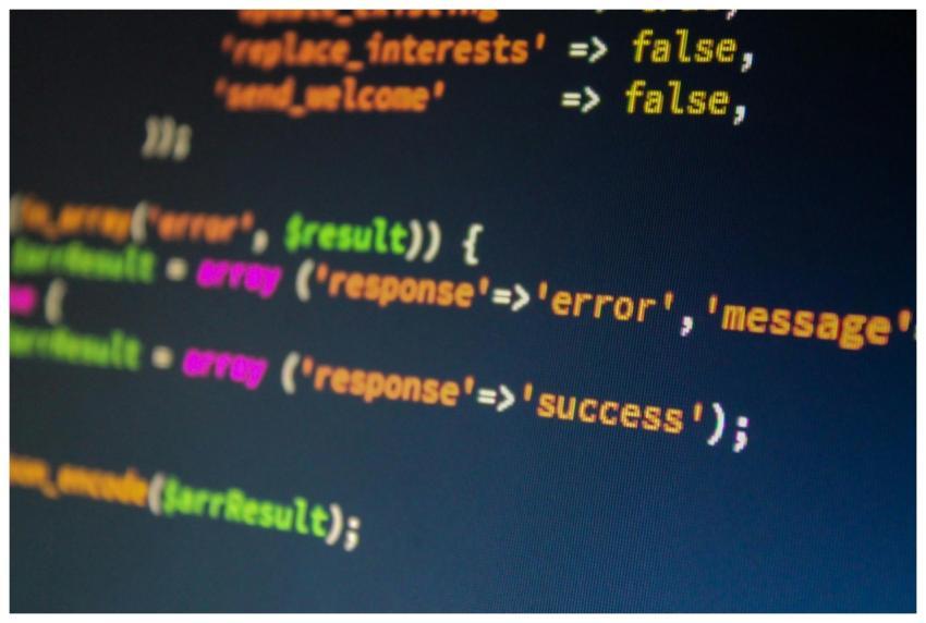 Close-up of PHP code on a monitor, highlighting de