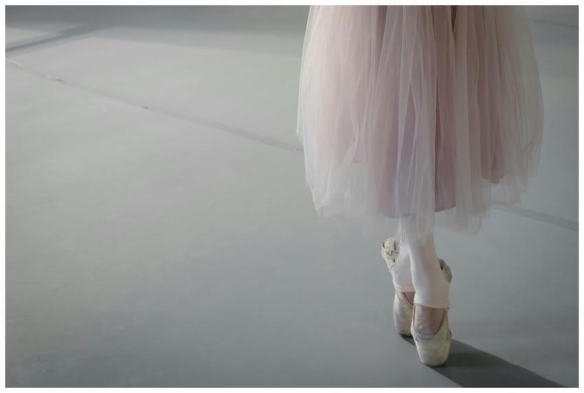 Close-up of a ballerina on pointe highlighting gra