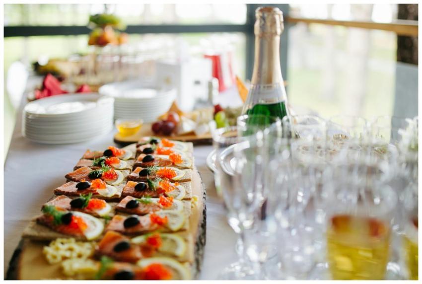 Platter of gourmet appetizers served with champagn