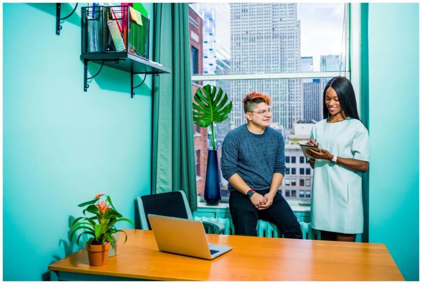 Business meeting between two colleagues in a moder