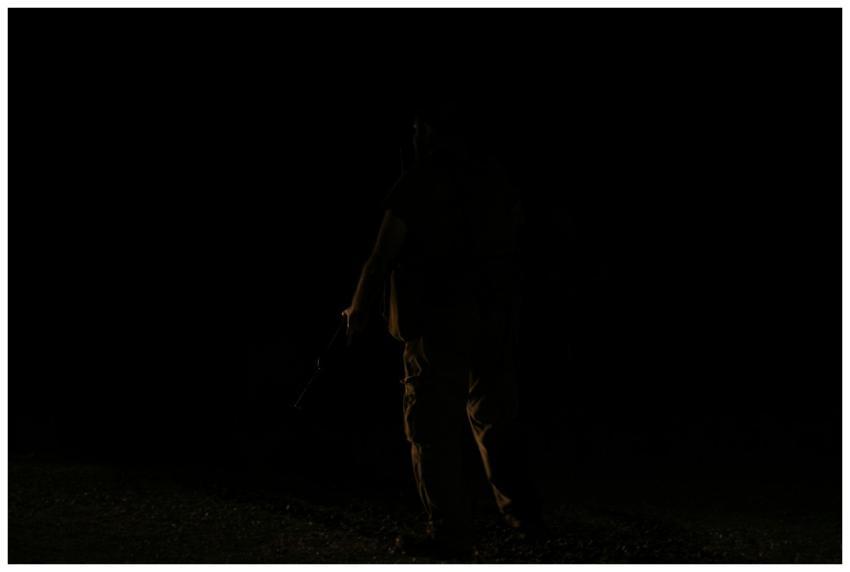 Back view of crop anonymous person silhouette with