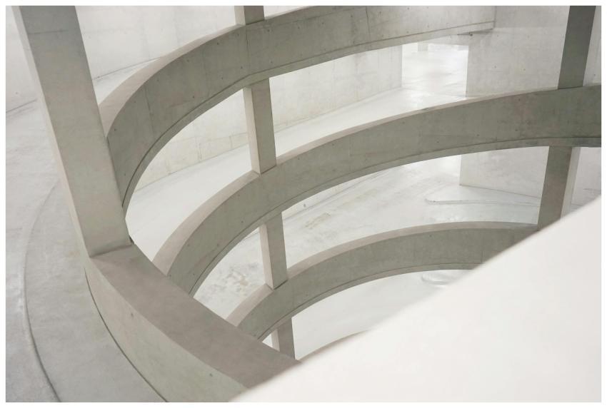 Minimalist spiral concrete architecture with moder