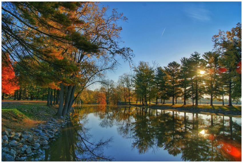 Peaceful autumn landscape of a lake with colorful