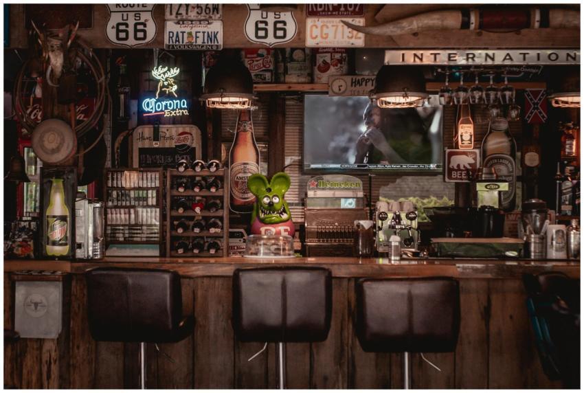 Cozy bar interior featuring Route 66 decor, rustic