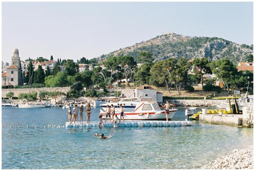 Vacationers Enjoying Sunny Day