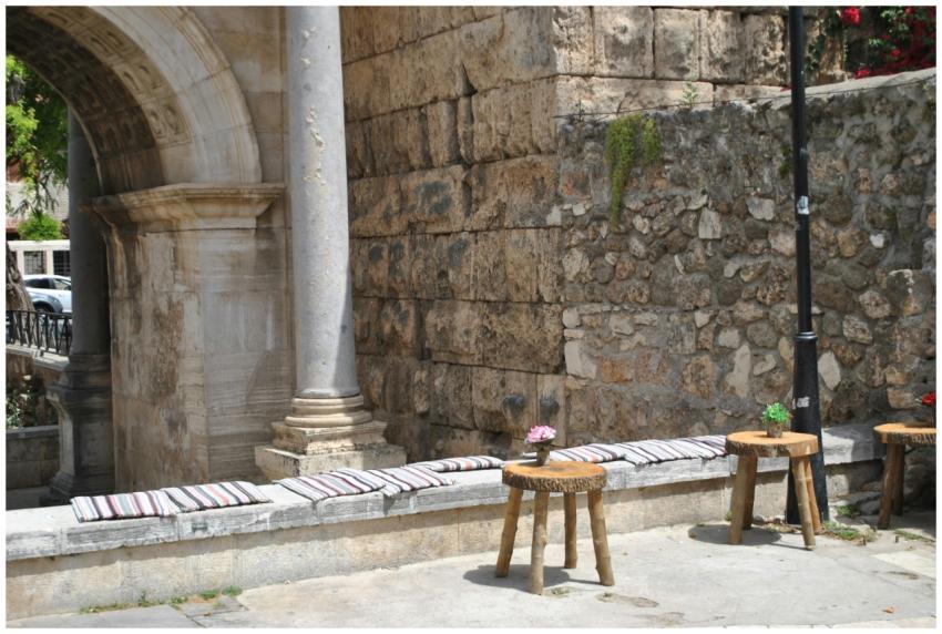 Inviting outdoor seating area with rustic stools a
