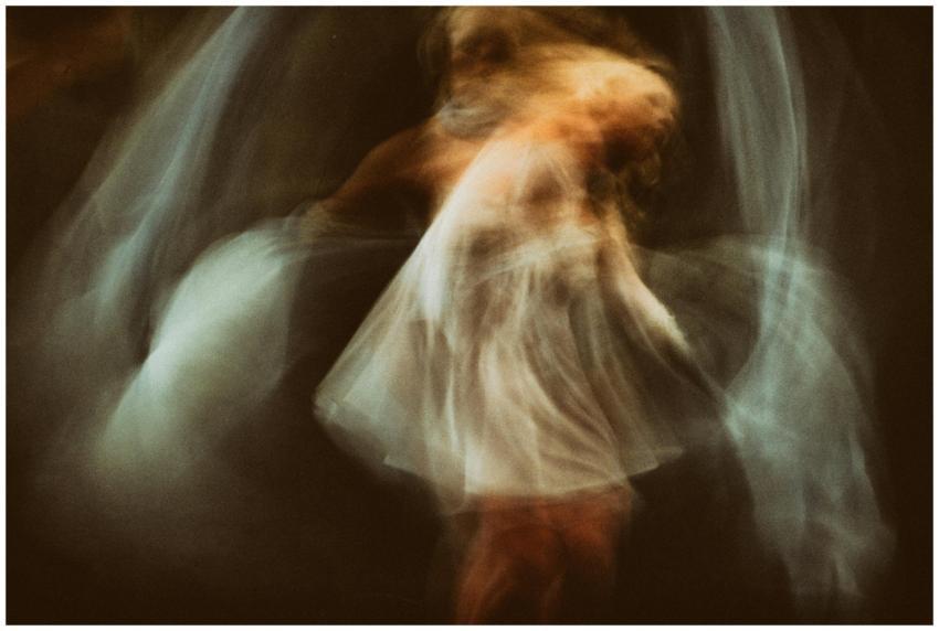 Abstract motion blur capture of a woman dancing, e