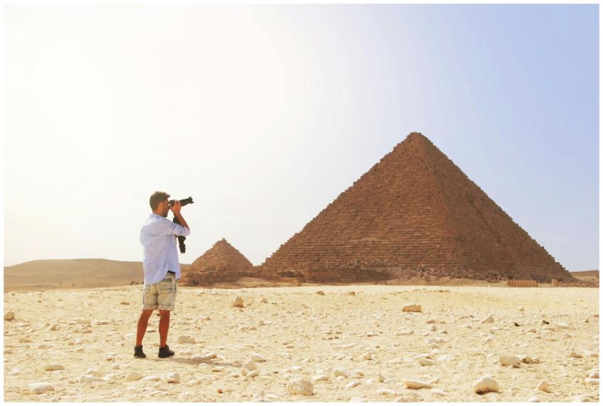 Photographer taking a picture of the Pyramid of Gi