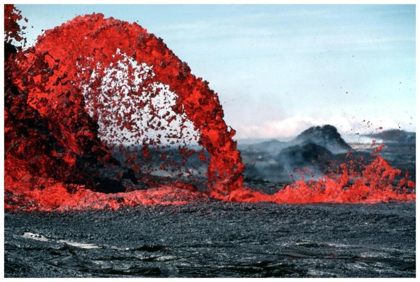 Stunning image of vibrant red lava flowing during
