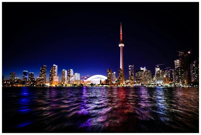 Vibrant Toronto skyline at night featuring the ico