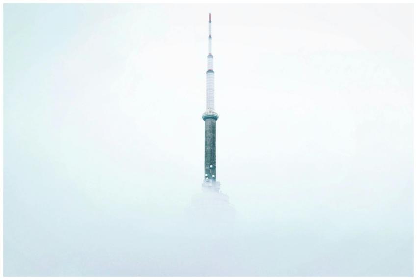 A minimalist view of a skyscraper piercing through