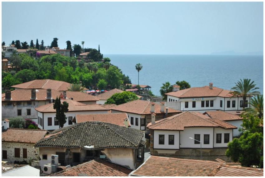 Charming Mediterranean coastal town with red-tiled