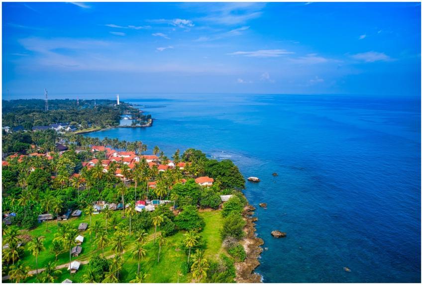 Aerial view of Banten's coastline with lush greene