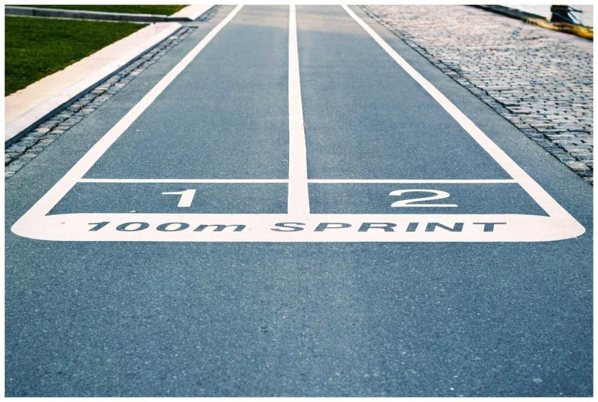 Close-up of outdoor 100m sprint track lanes, perfe