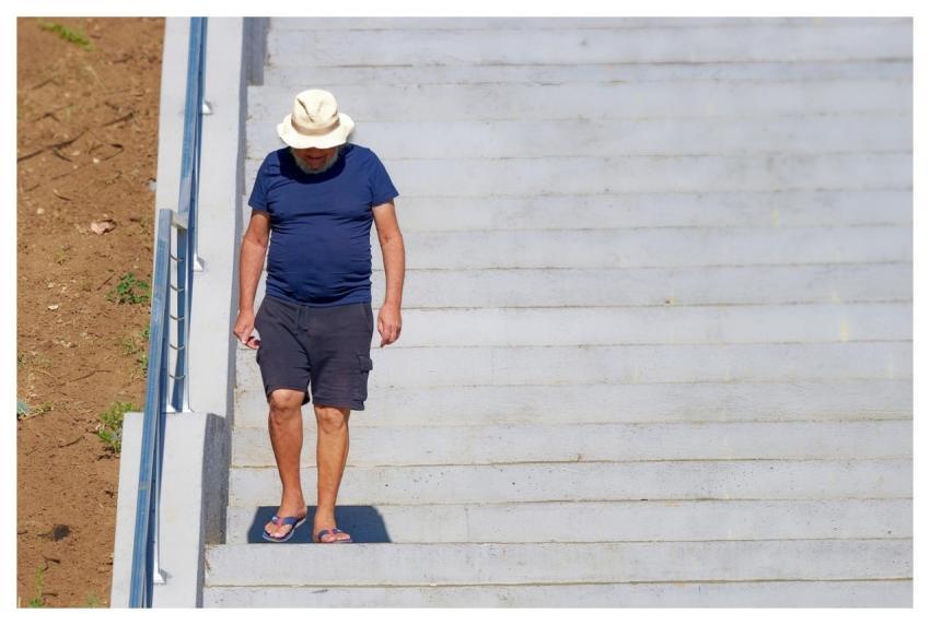 Man Casual Descending Stairs