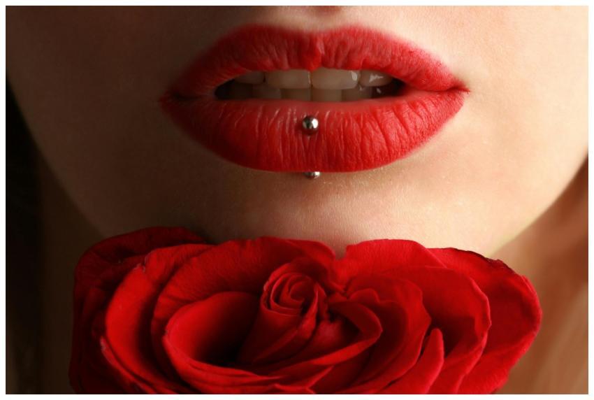 Aesthetic close-up featuring red lipstick, lip pie