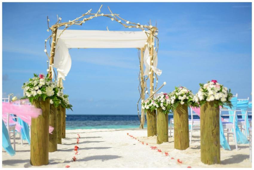 A beautiful beach wedding setup featuring a floral