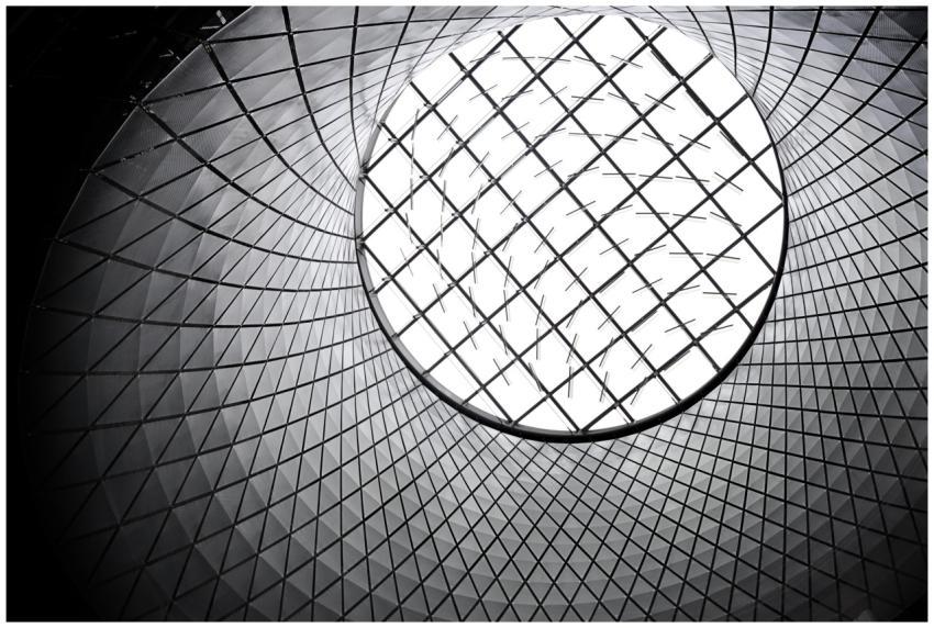 Worm's eye view of a futuristic geometric skylight