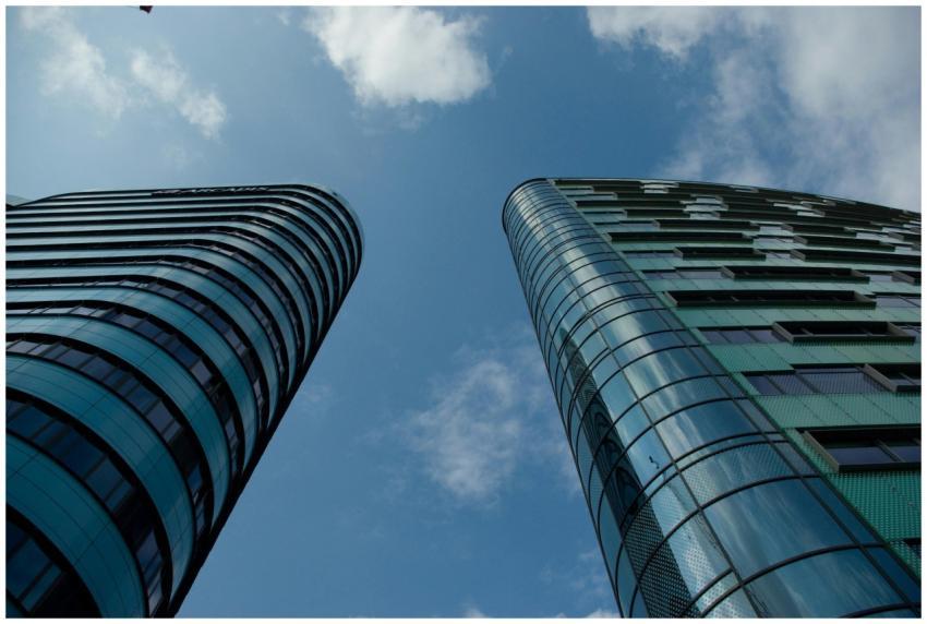 Low angle view of modern glass skyscrapers in an u