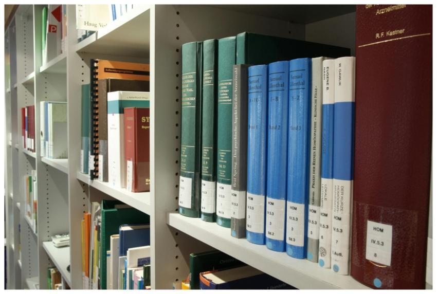 Neatly arranged bookshelves in a contemporary libr