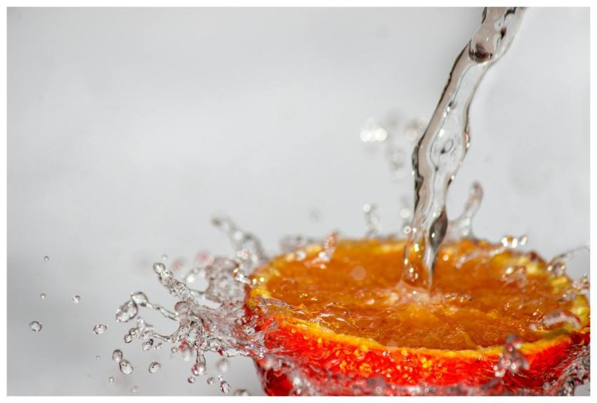 A high-speed capture of water splashing onto a jui