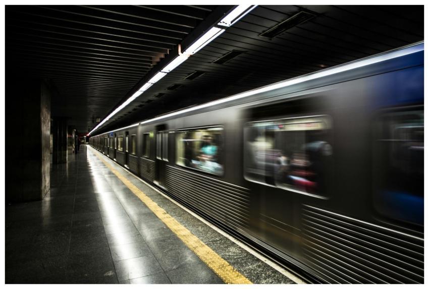 Long exposure shot of a subway train speeding thro