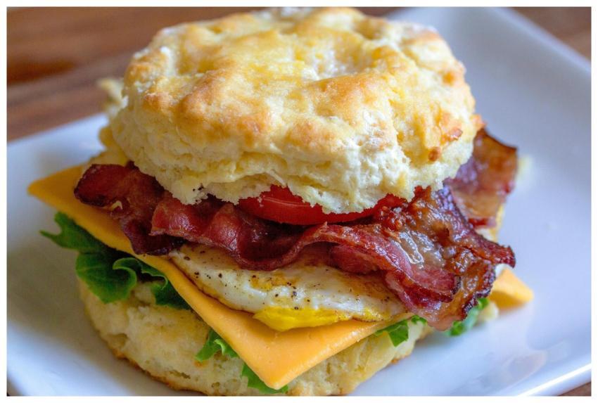 Delicious breakfast biscuit sandwich with bacon, e
