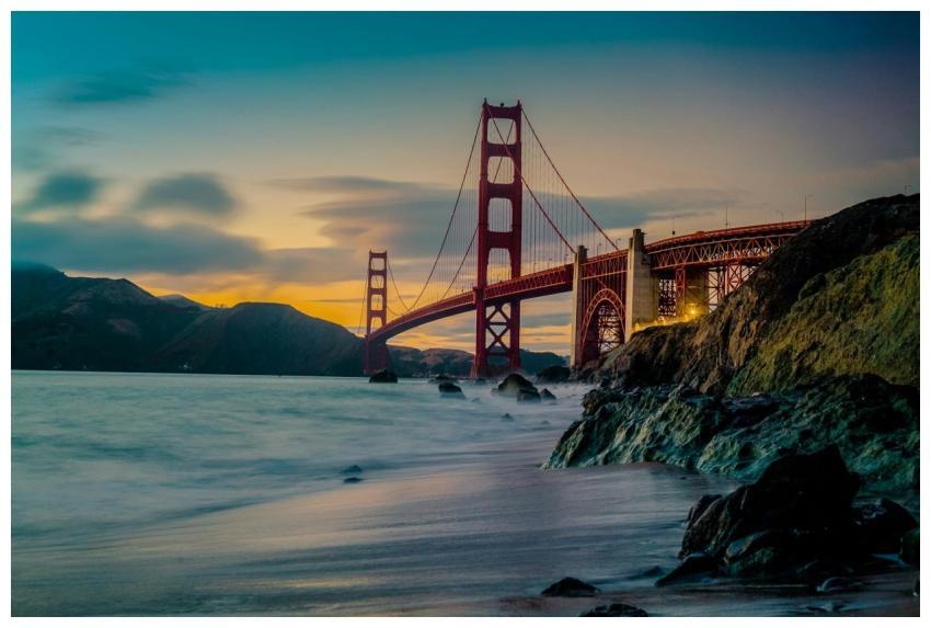 Stunning view of the Golden Gate Bridge at dusk wi