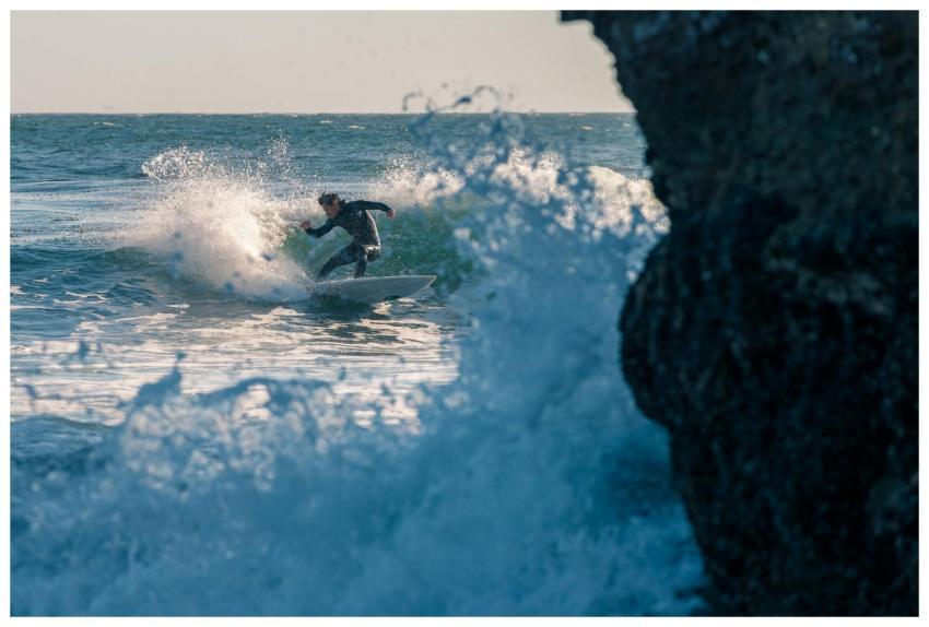 Thrilling shot of a surfer expertly navigating pow