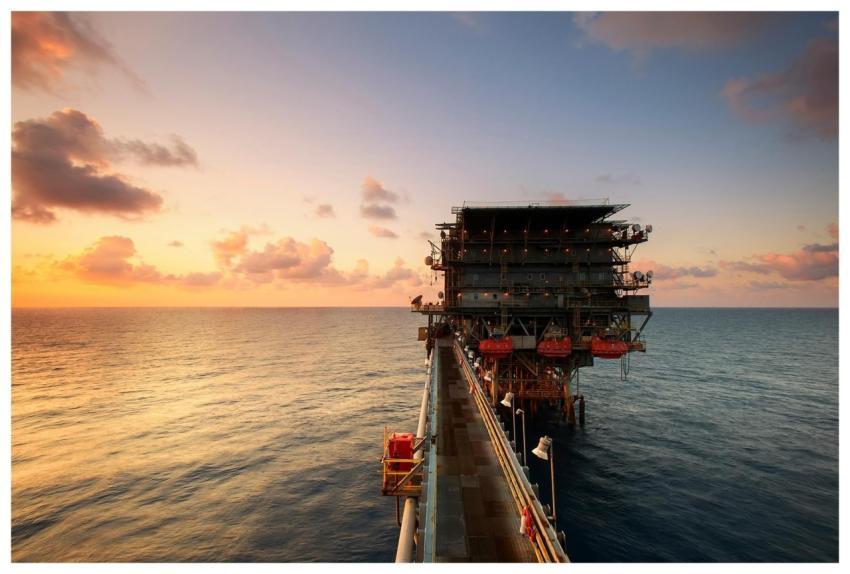 A breathtaking view of an oil platform on the ocea