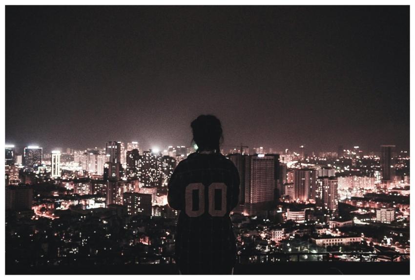 Silhouette of a person overlooking Hà Nội's city l