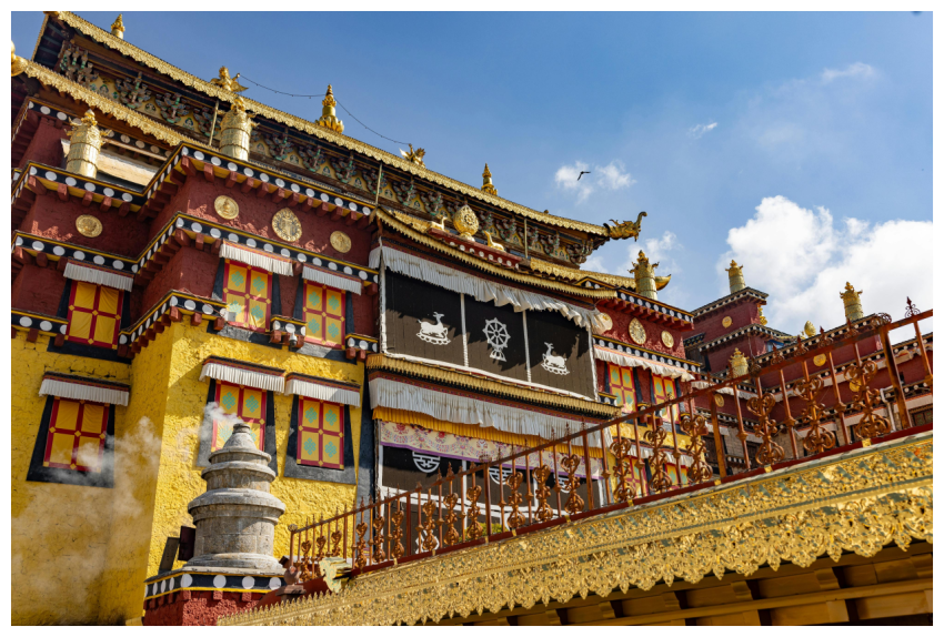 Richly decorated Tibetan monastery exterior with v