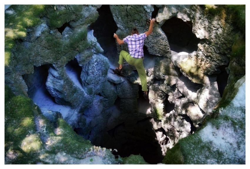 Man Casual Climbing Stones