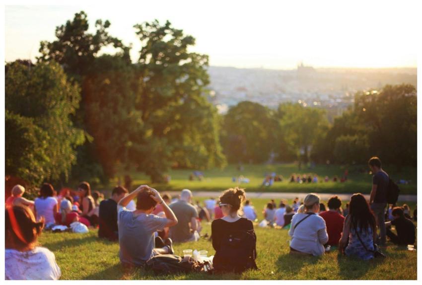 People relaxing and enjoying a sunny day in a bust