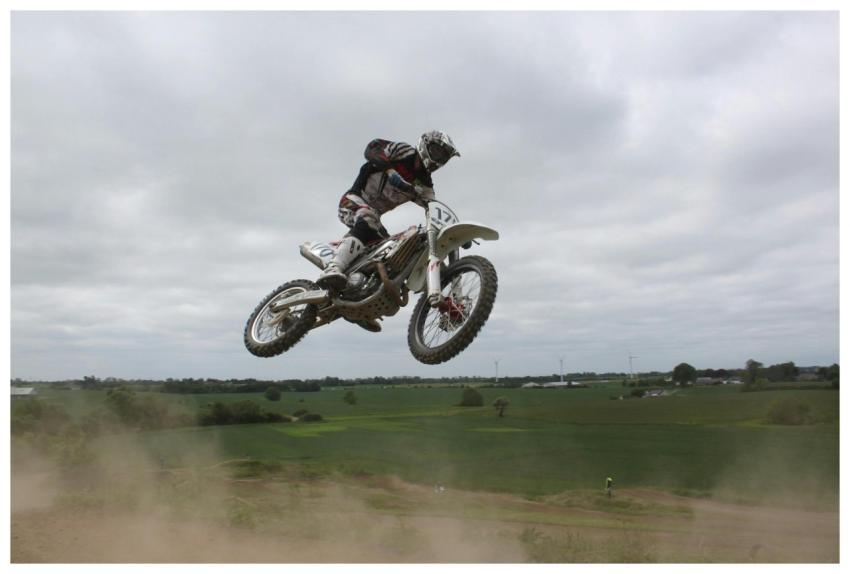 A thrilling motocross action shot capturing a ride