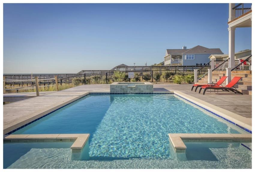 Stunning infinity pool at a seaside resort, perfec