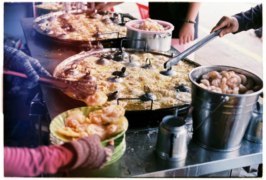 Vibrant street food scene capturing the preparatio