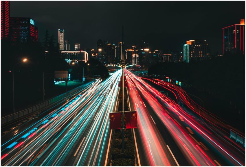 Dynamic light trails of traffic in an illuminated