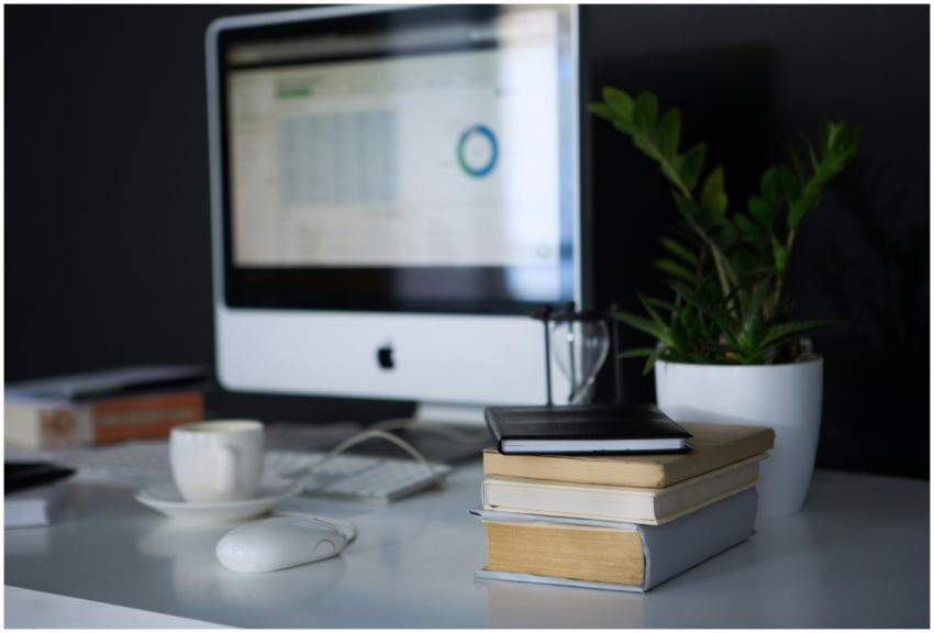 A sleek modern office setup featuring a computer,