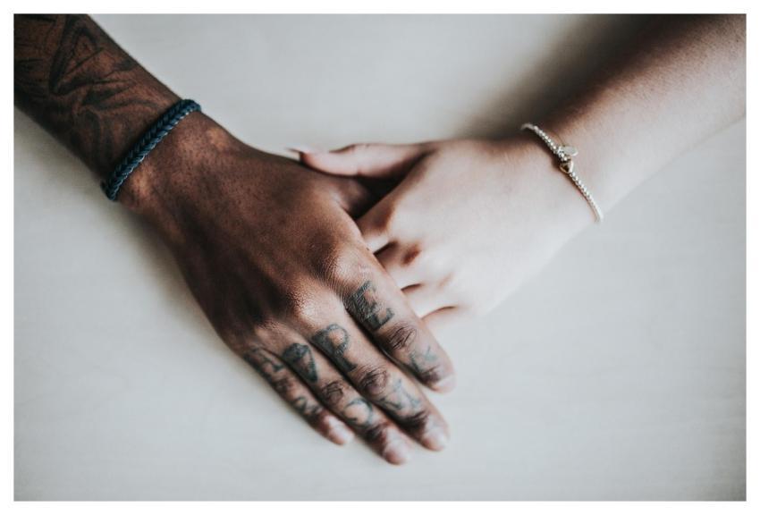 Hands Holding Adults Bracelets