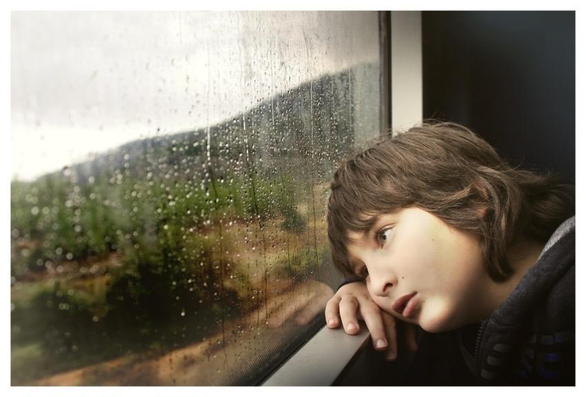 Little Boy Window Waiting Bored