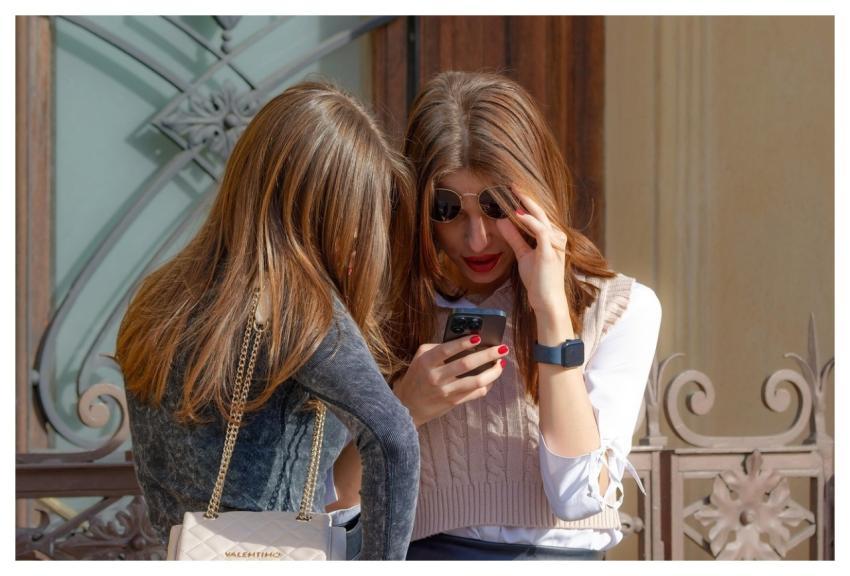 Girls Looking Together Smartphone